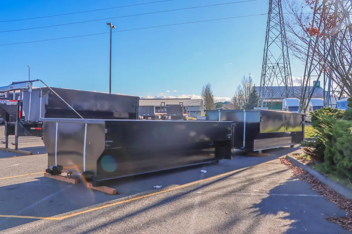 Roll-off dumpster ready for waste disposal at job site for Construction Dumpster Rental in South Gate Ridge